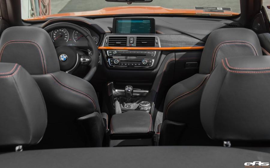 Интерьер BMW M4 Convertible Individual Fire Orange by EAS 2016 года  (фото 7 из 25)
